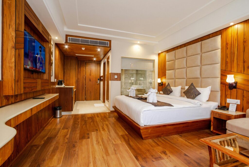 Modern bedroom interior with wooden furniture designed by professional interior designers.